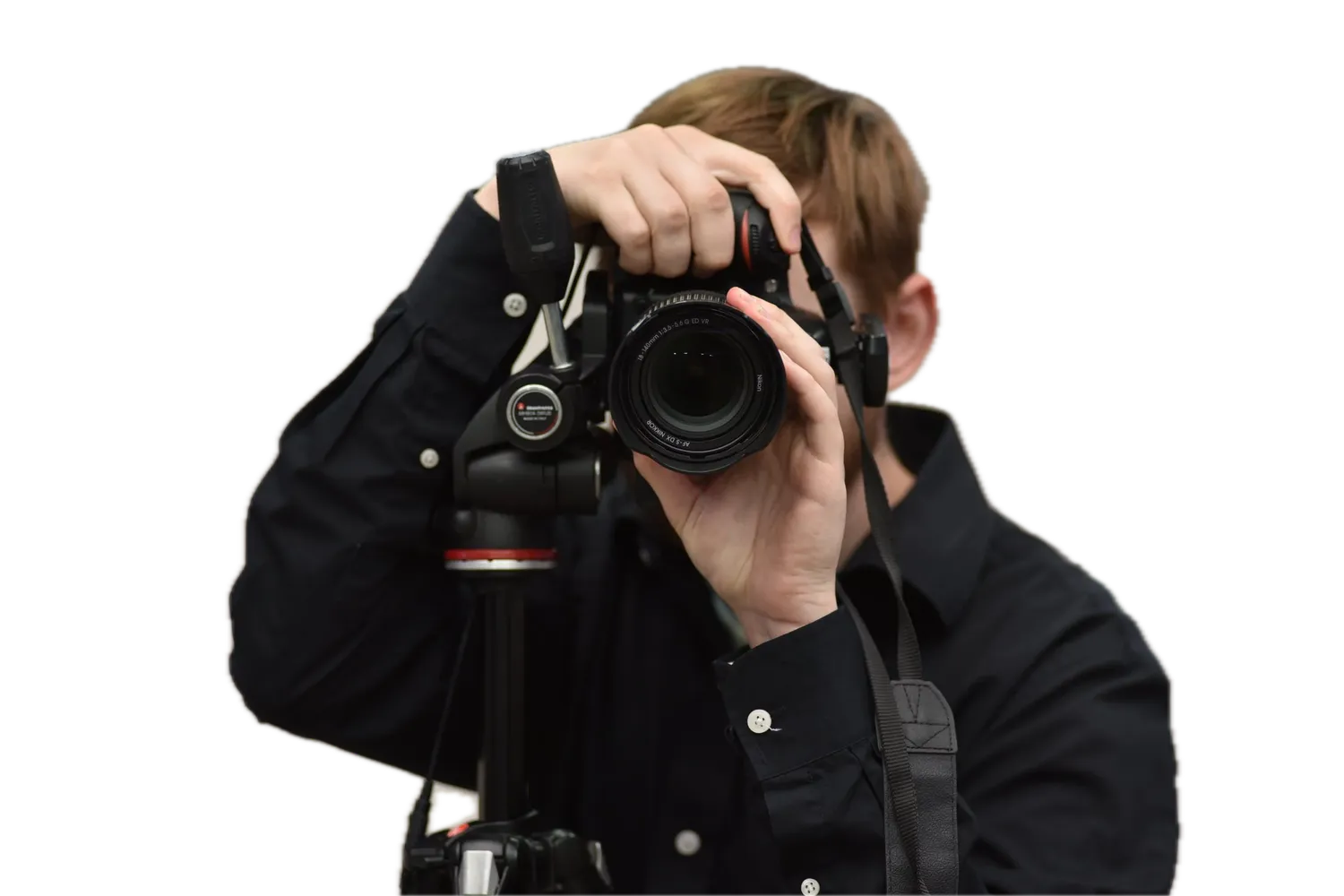 Grads photographer looking through a camera on a tripod